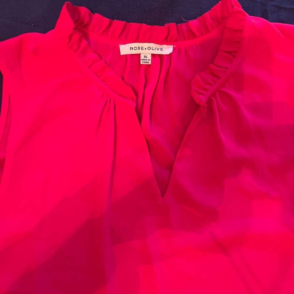 Lovely femine sleeveless in a beautiful rose red pink shade